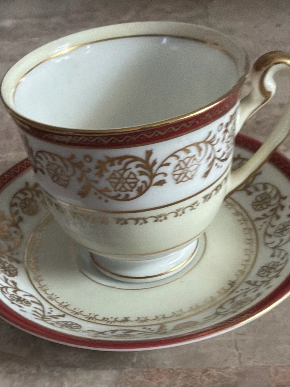 Elegant Gold-Trimmed Hira White Teacup and Saucer with Red Accent